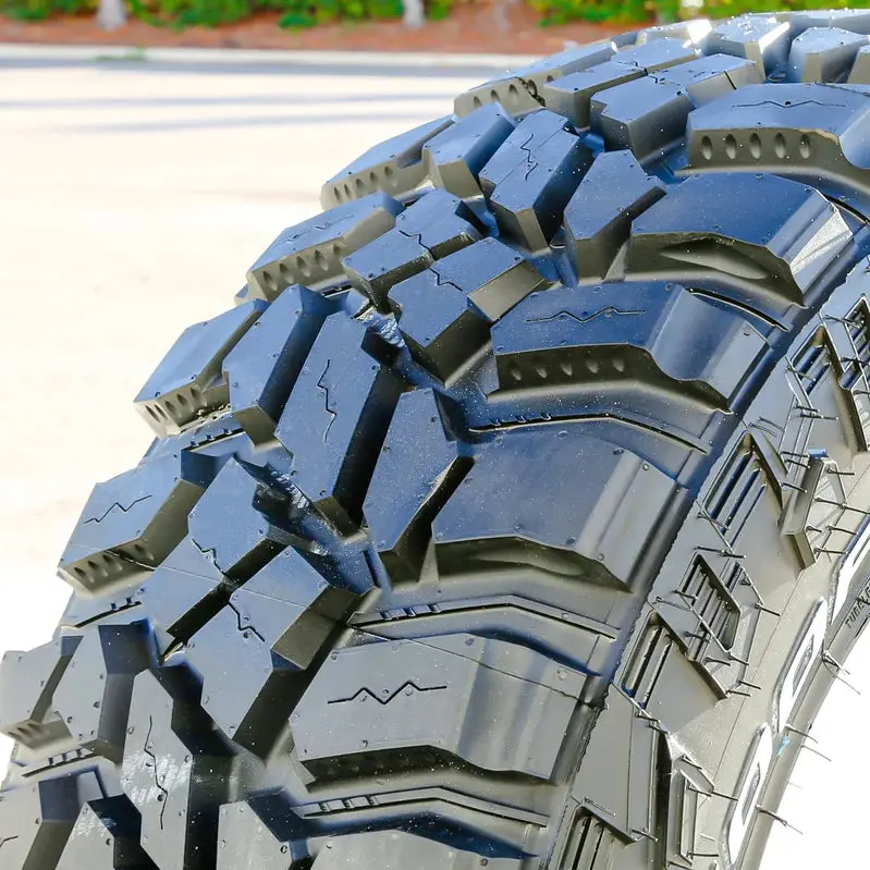 Four Cooper STT Pro LT 275/70R18 E-Rated Off-Road Mud-Terrain Tires with Bold Tread Pattern