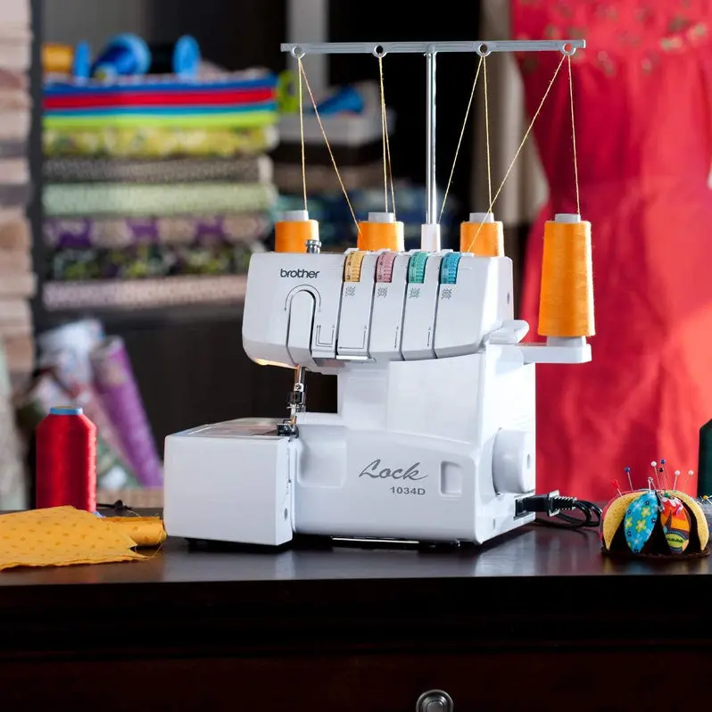 Juki 1034D Heavy-Duty Metal-Frame Serger with 1300 Stitches Per Minute and Trim Catcher Accessory Kit